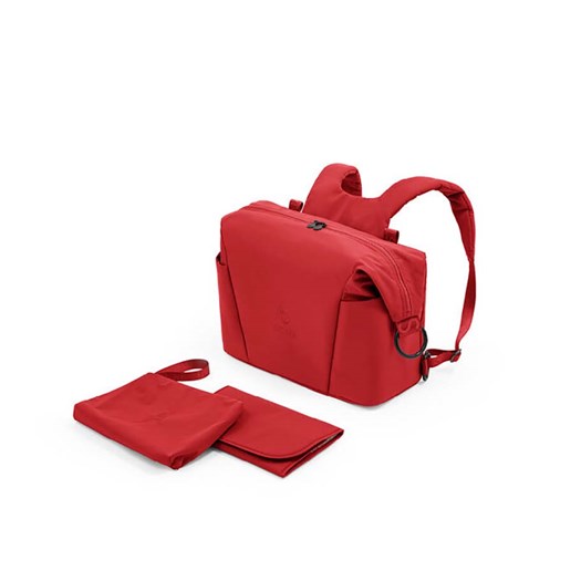 Läs mer om Stokke skötväska & ryggsäck, ruby red